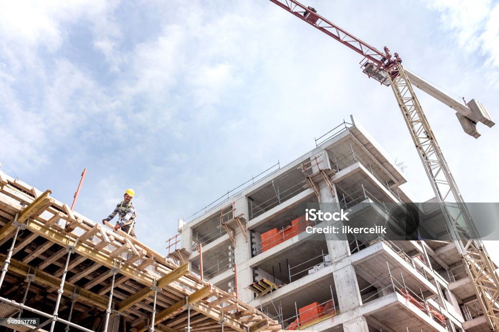 Home a new building is being constructed with use of tower crane